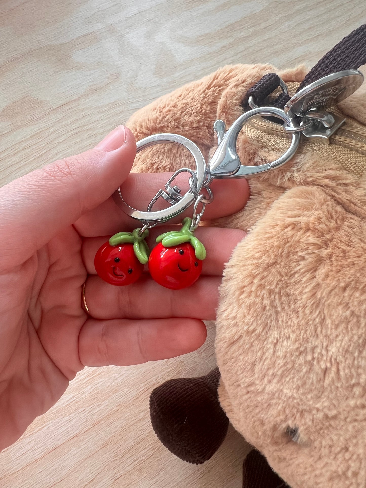 jellycat tomato phone charm