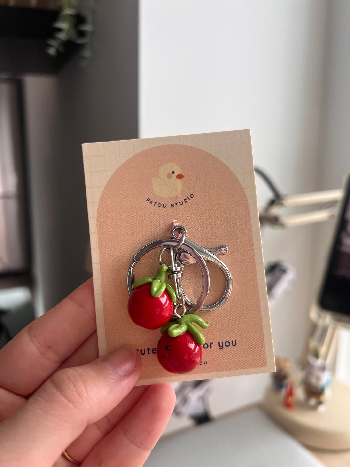 jellycat tomato phone charm