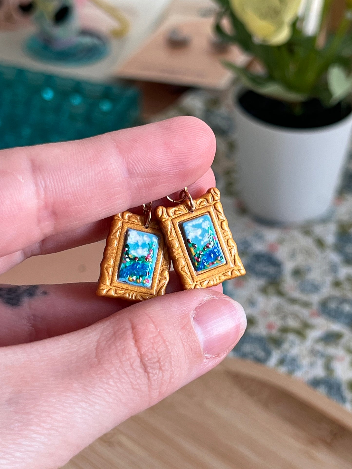 cottage core tiny paintings dangle earrings | cat, forest, river