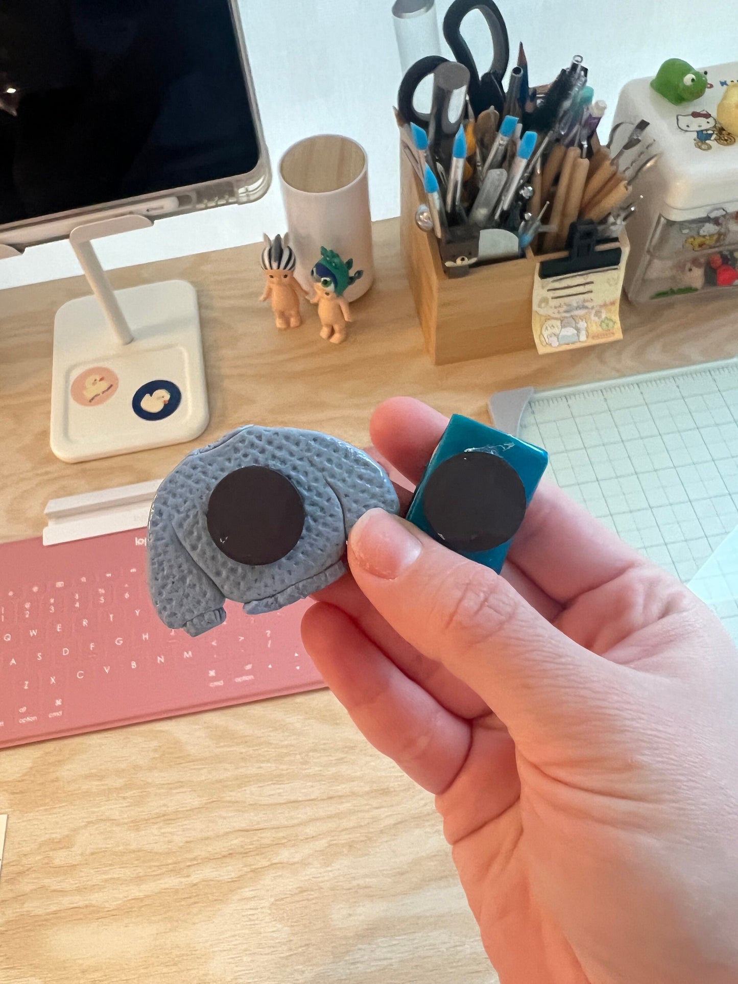 miniature book or sweater fridge magnets
